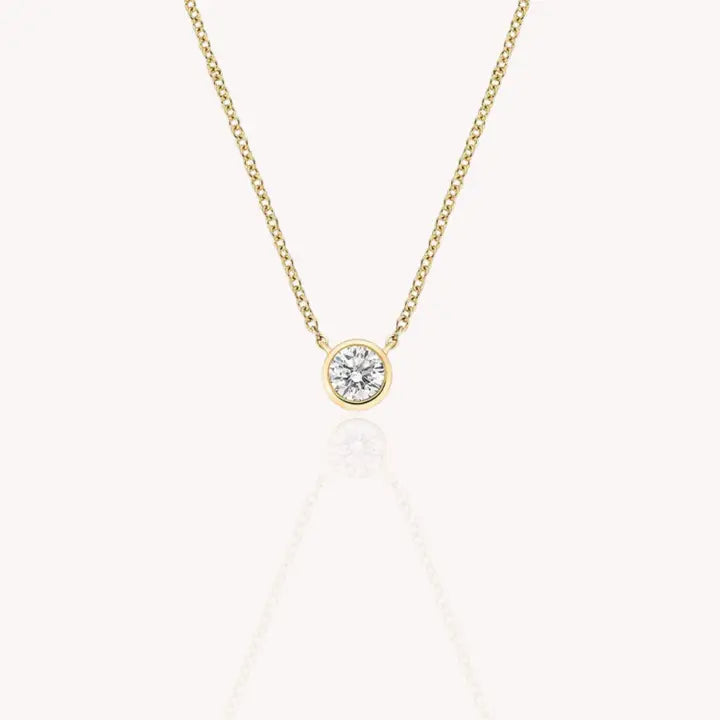 Bezel Solitaire Round Necklace in Yellow Gold 0.5 Carats
